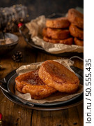 Traditional Portuguese Christmas Rabanadas. Spanish Torrijas on kitchen countertop. Стоковое фото, агентство Ingram Publishing / Фотобанк Лори