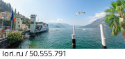 Scenic view of the marina with a ferry in Varenna on Lake Como. Стоковое фото, агентство Ingram Publishing / Фотобанк Лори