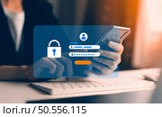 cyber security concept, man's hand using a smartphone Log in to applications via fingerprint scanning. It is the security of the information. Стоковое фото, агентство Ingram Publishing / Фотобанк Лори
