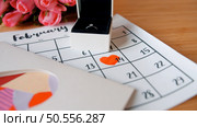 rose on the calendar with the date of February 14 Valentine's day - sweety effect picture style. Стоковое фото, агентство Ingram Publishing / Фотобанк Лори