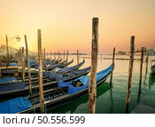 Gondolas and San Giorgio Maggiore island in Venice, Italy. Стоковое фото, агентство Ingram Publishing / Фотобанк Лори