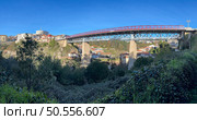 The Corgo river metallic road bridge was opened in May 1904 and joins the banks of the city of Vila Real. Стоковое фото, агентство Ingram Publishing / Фотобанк Лори