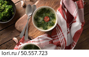 Caldo verde popular soup in Portuguese cuisine. traditional ingredients for caldo verde are potatoes, collard greens , olive oil and salt. Additionally garlic or onion may be added. Стоковое фото, агентство Ingram Publishing / Фотобанк Лори