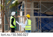 Portrait of architect and engineer with experience in multi-story building construction. Стоковое фото, агентство Ingram Publishing / Фотобанк Лори