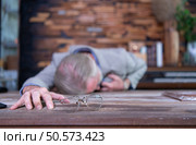 An elderly businessman suffered a sudden heart failure at work. Стоковое фото, агентство Ingram Publishing / Фотобанк Лори
