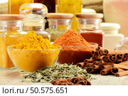 Composition with variety of spices on kitchen table. Стоковое фото, агентство Ingram Publishing / Фотобанк Лори