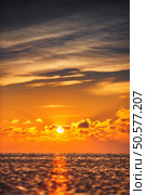 Beautiful cloudscape over the sea, sunrise shot. Стоковое фото, агентство Ingram Publishing / Фотобанк Лори