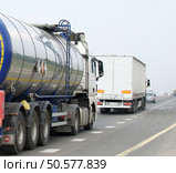 Container on the big highway. transport loads. Стоковое фото, агентство Ingram Publishing / Фотобанк Лори