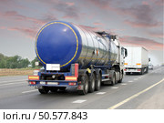Container on the big highway. transport loads. Стоковое фото, агентство Ingram Publishing / Фотобанк Лори