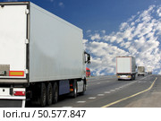 Container on the big highway. transport loads         . Стоковое фото, агентство Ingram Publishing / Фотобанк Лори