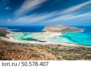 Tourists relax and bath in crystal clear water of Balos beach. Стоковое фото, агентство Ingram Publishing / Фотобанк Лори
