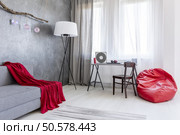 Shot of a spacious living room interior designed in gray tones. Стоковое фото, агентство Ingram Publishing / Фотобанк Лори