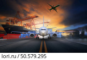 ship loading container in import - export pier and air cargo plane approach in airport use for transport and freight logistic business industry background. Стоковое фото, агентство Ingram Publishing / Фотобанк Лори