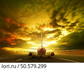 passenger plane ready to take off on airport runways use for traveling ,cargo ,air transport ,business . Стоковое фото, агентство Ingram Publishing / Фотобанк Лори