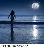 Woman is going to swimming under moonlight. Стоковое фото, агентство Ingram Publishing / Фотобанк Лори