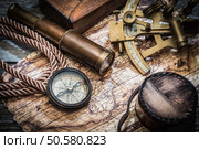 vintage still life with compass,sextant and spyglass . Стоковое фото, агентство Ingram Publishing / Фотобанк Лори