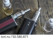 Advanced personal vaporizer or e-cigarette, from above. Стоковое фото, агентство Ingram Publishing / Фотобанк Лори