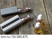 Advanced personal vaporizer or e-cigarette, close up. Стоковое фото, агентство Ingram Publishing / Фотобанк Лори