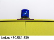 Blue rotating beacon on yellow ambulance car. Стоковое фото, агентство Ingram Publishing / Фотобанк Лори