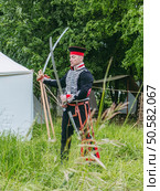Russian Hussar with Sabres From 19th Century. Редакционное фото, фотограф Константин Григорьев / Фотобанк Лори