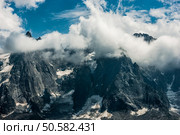 Cloudy Mont Blanc Massif in July. Chamonix, France, Europe. French Alps. Стоковое фото, агентство Ingram Publishing / Фотобанк Лори