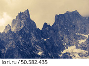 Cloudy Alp Mountains Scenery. Granite Alp Peaks. France, Europe. Стоковое фото, агентство Ingram Publishing / Фотобанк Лори