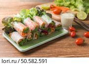 crab stick salad roll on wood background. Стоковое фото, агентство Ingram Publishing / Фотобанк Лори