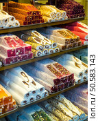 Eastern sweets in a wide range, baklava, Turkish delight. Стоковое фото, агентство Ingram Publishing / Фотобанк Лори