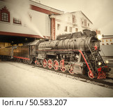 Morning departure of the retro steam train. Vintage image. . Стоковое фото, агентство Ingram Publishing / Фотобанк Лори