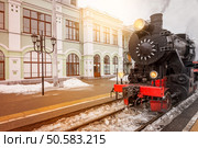 Departure of the retro steam train at spring time.. Departure of the retro steam train. Стоковое фото, агентство Ingram Publishing / Фотобанк Лори