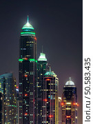 Majestic colorful dubai marina skyline during night. Multiple tallest skyscrapers of the world. Dubai marina, United Arab Emirates. Стоковое фото, агентство Ingram Publishing / Фотобанк Лори