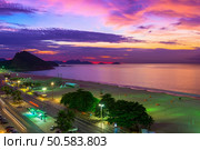 Sunset on Copacabana and Leme beach in Rio de Janeiro, Brazil. Стоковое фото, агентство Ingram Publishing / Фотобанк Лори