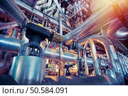 Equipment, cables and piping as found inside of a industrial power plant. Стоковое фото, агентство Ingram Publishing / Фотобанк Лори