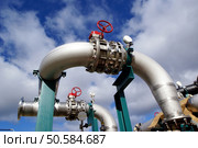 industrial piping against blue sky                . Стоковое фото, агентство Ingram Publishing / Фотобанк Лори