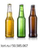set of Beer bottles with water drops on white background.Five separate photos merged together. Стоковое фото, агентство Ingram Publishing / Фотобанк Лори