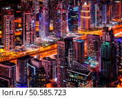Dubai cityscape at night, view from Burj Khalifa’s 124th floor. Стоковое фото, агентство Ingram Publishing / Фотобанк Лори