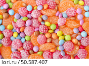 Sweet multicolor candies spreading  on background. Стоковое фото, агентство Ingram Publishing / Фотобанк Лори