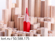One sharpened red pencil among many ones. Стоковое фото, агентство Ingram Publishing / Фотобанк Лори
