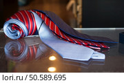 Close up of neckties exposed in the clothes shop. Стоковое фото, агентство Ingram Publishing / Фотобанк Лори