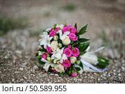 Boutonniere groom on the jacket. Стоковое фото, агентство Ingram Publishing / Фотобанк Лори