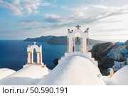 white belfries Santorini island, Greece. Стоковое фото, агентство Ingram Publishing / Фотобанк Лори
