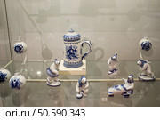 Moscow, Russia - March 1, 2025: The exhibition of the famous Russian brand Gzhel is the production of tableware and other ceramic products. Редакционное фото, фотограф Татьяна Васильева / Фотобанк Лори