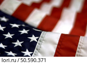horizontal american flag independence day holiday 4 4th July red white blue star stripe America American liberty free freedom democracy patriotic patriotism United States USA US pride Uncle Sam unity closeup close up symbolic still life VStock. Стоковое фото, агентство Ingram Publishing / Фотобанк Лори