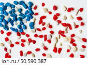 Colored stones - stylized image of the American flag as background. Stones - stylized image of the American flag. Стоковое фото, агентство Ingram Publishing / Фотобанк Лори