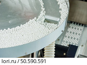 pharmaceutical medicine tablet pill production background at pharmacy industry manufacture. pharmacy medicine pill production background. Стоковое фото, агентство Ingram Publishing / Фотобанк Лори