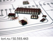 Integrated circuits on the schematics. Стоковое фото, агентство Ingram Publishing / Фотобанк Лори