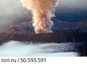 Volcano with wide-caldera erupting. Стоковое фото, агентство Ingram Publishing / Фотобанк Лори
