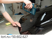 Tinting of car windows.Window film for car. Стоковое фото, фотограф Александр Поташев / Фотобанк Лори