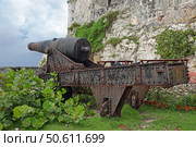 Старая пушка в крепости Кастильо-дель-Морро (Эль-Морро), известной также как Крепость волхвов, Гавана, республика Куба. Стоковое фото, фотограф Игорь Долгов / Фотобанк Лори