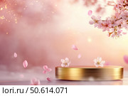 A gold-leafed podium sits elegantly against a pink sky. The scene is graced by floating cherry blossom petals, casting a serene and illuminated ambiance perfect for a luxurious display. Стоковое AI-изображение, AI-художник Nart / Фотобанк Лори